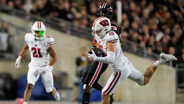 Wisconsin safety John Torchio intercepting a pass against Ohio State